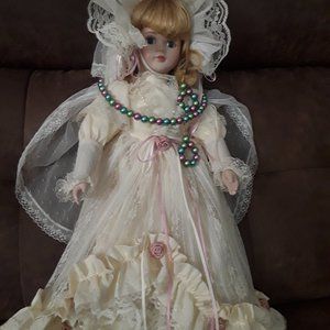 Vintage doll 18,5". Memory wire necklace and earrings are free gift.